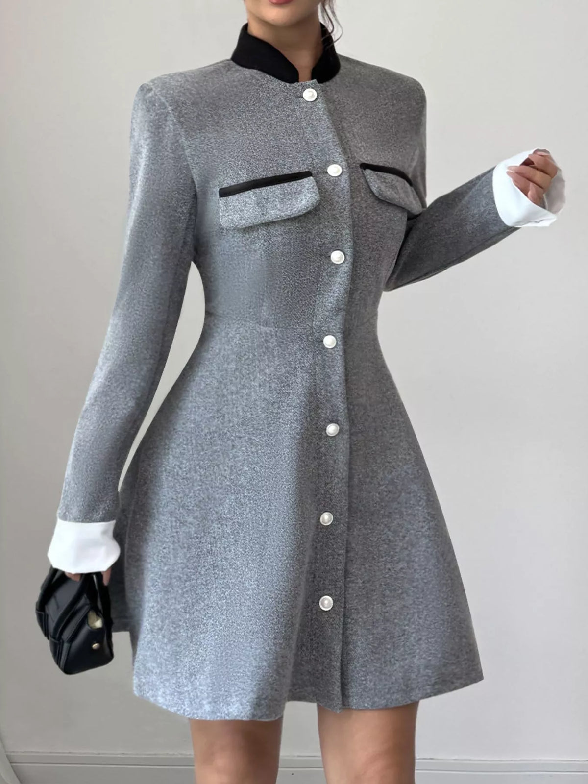 a line long sleeve button down dress in gray side view