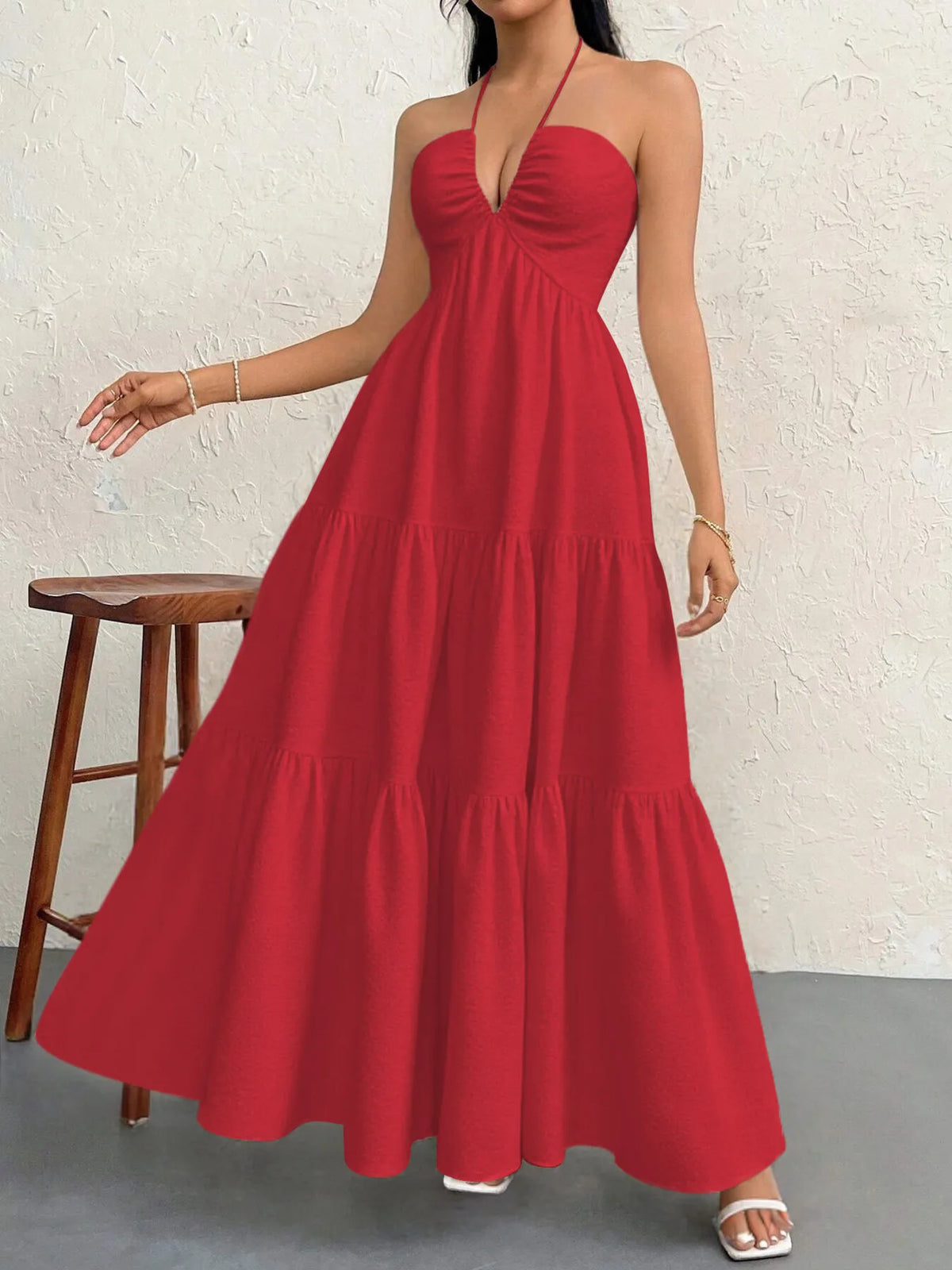halter neck tiered backless maxi dress hem detail