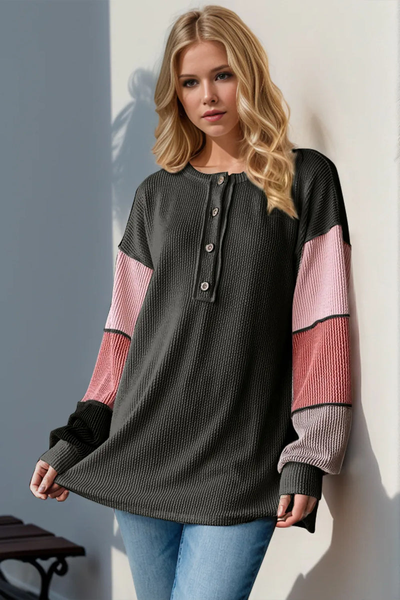 Front view of color block round neck long sleeve top
