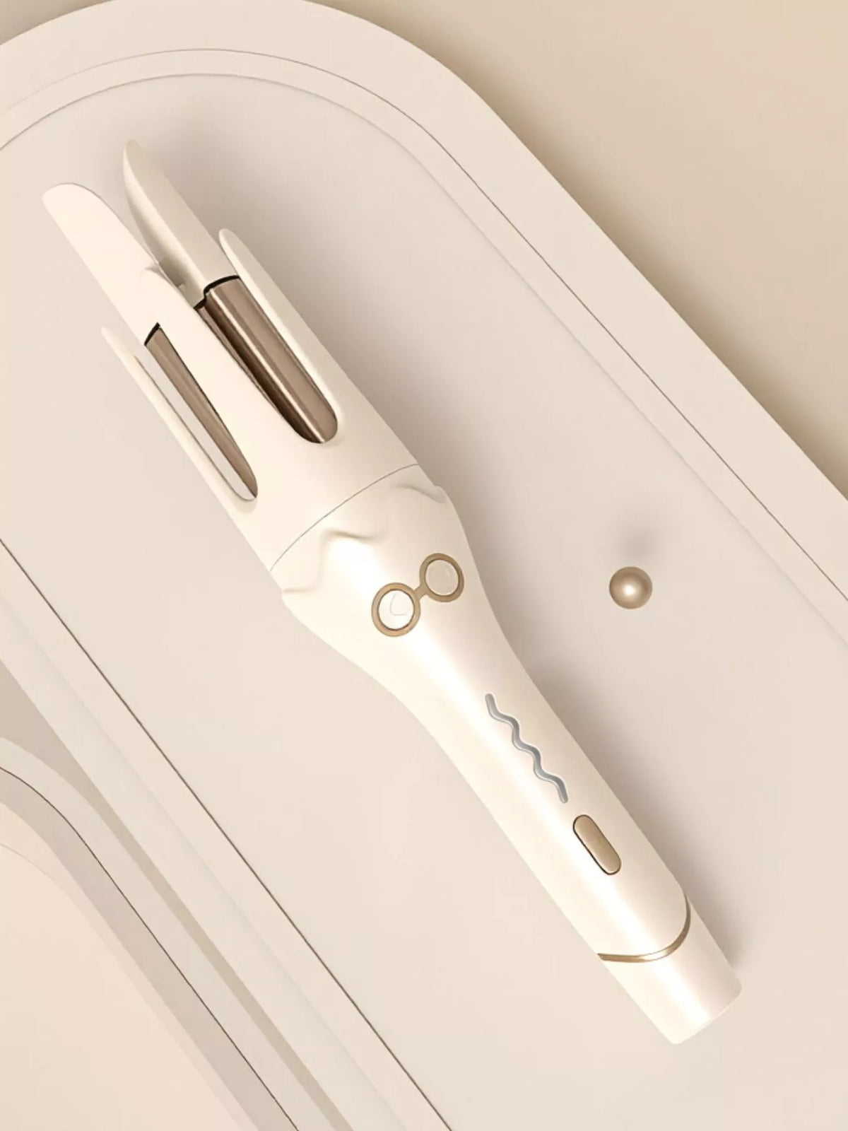 Rotating curling iron barrel detail