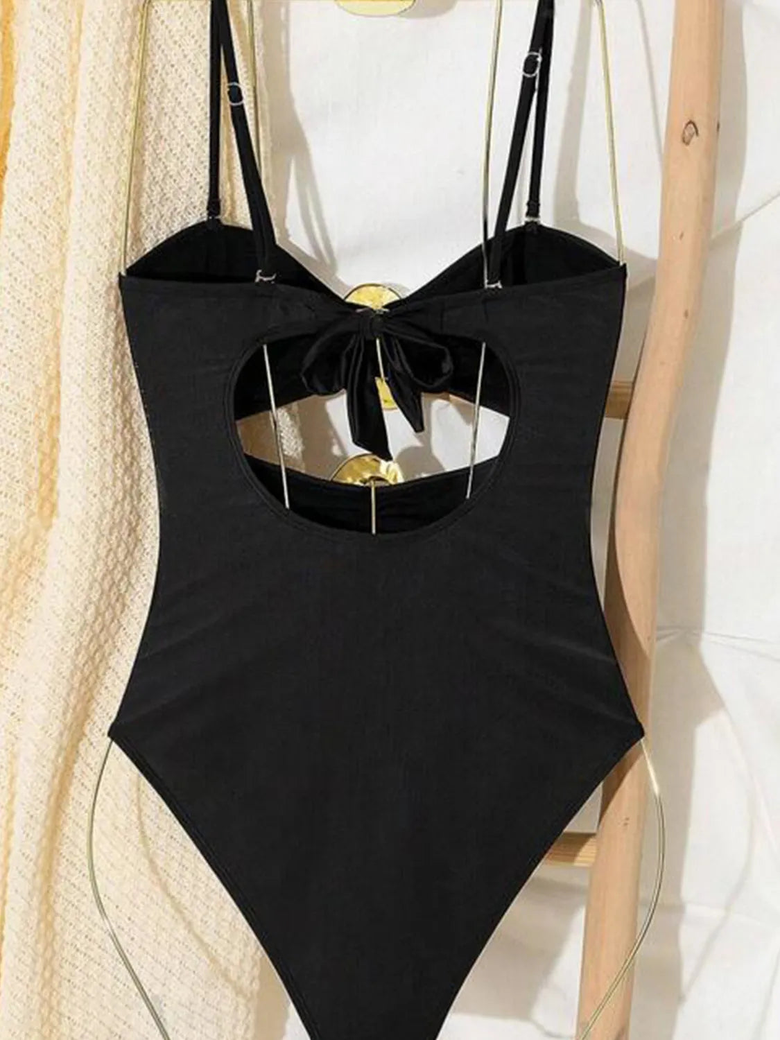 Black sweetheart swimsuit tied side detail