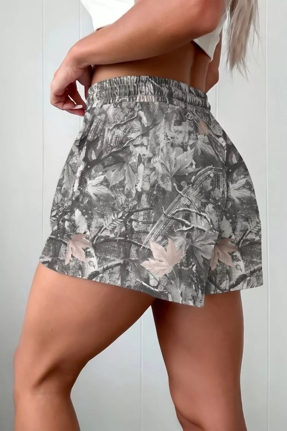 Grey abstract maple leaf print drawstring shorts side view