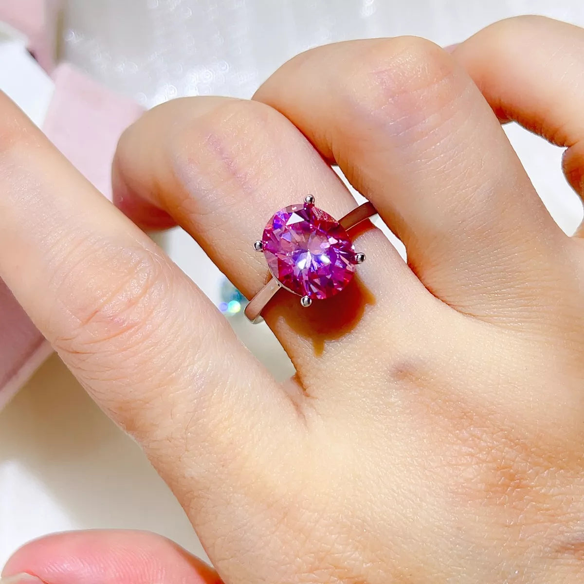 Starglow 5 carat hot pink moissanite ring in sterling silver, front view