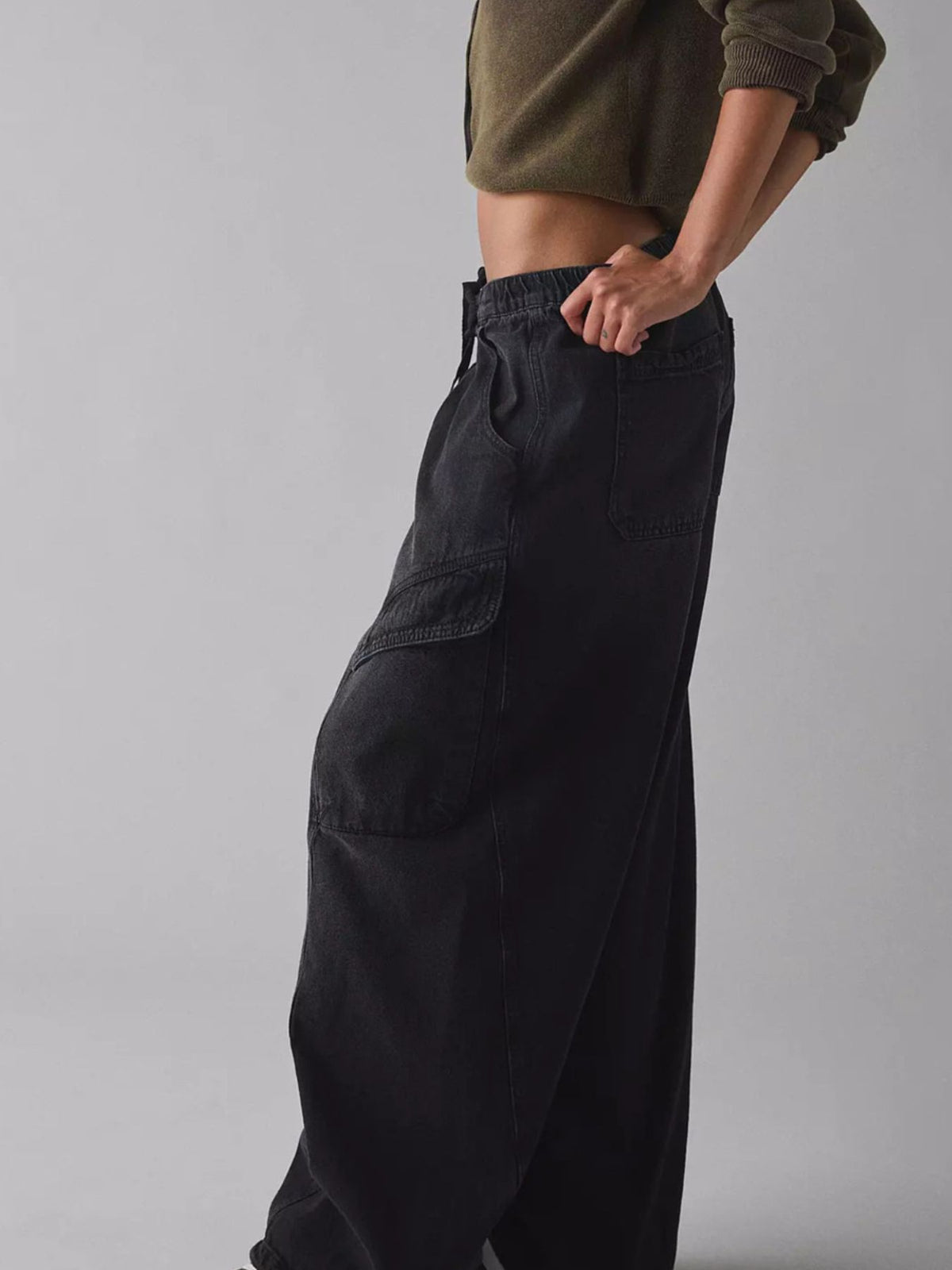 Full length cargo jeans pose