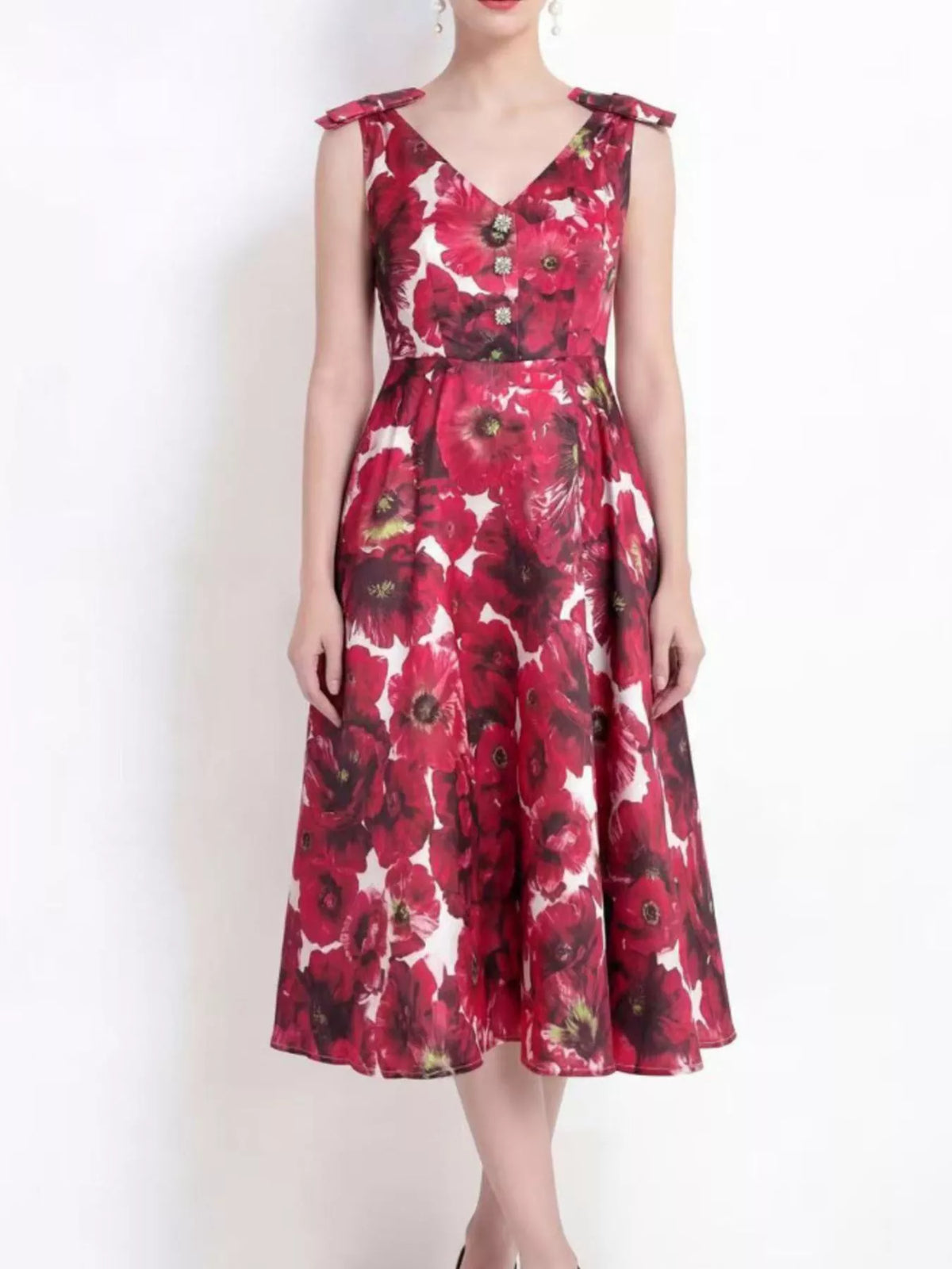Sleeveless floral dress in burgundy shown on a model
