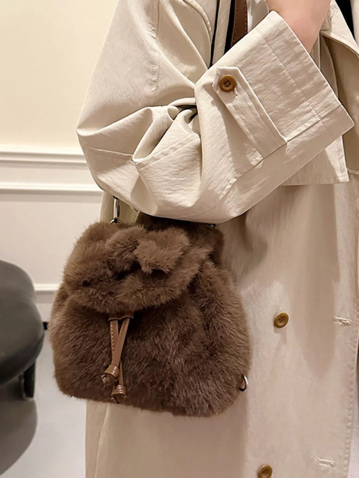 Ivory plush backpack angled view