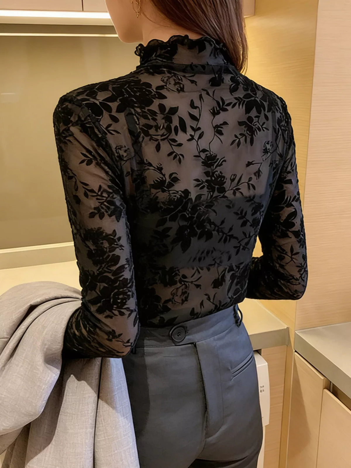 Floral Sheer Turtleneck Top on model