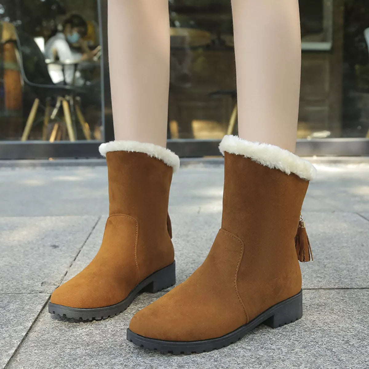 Round toe plush lined suede boots styled on model