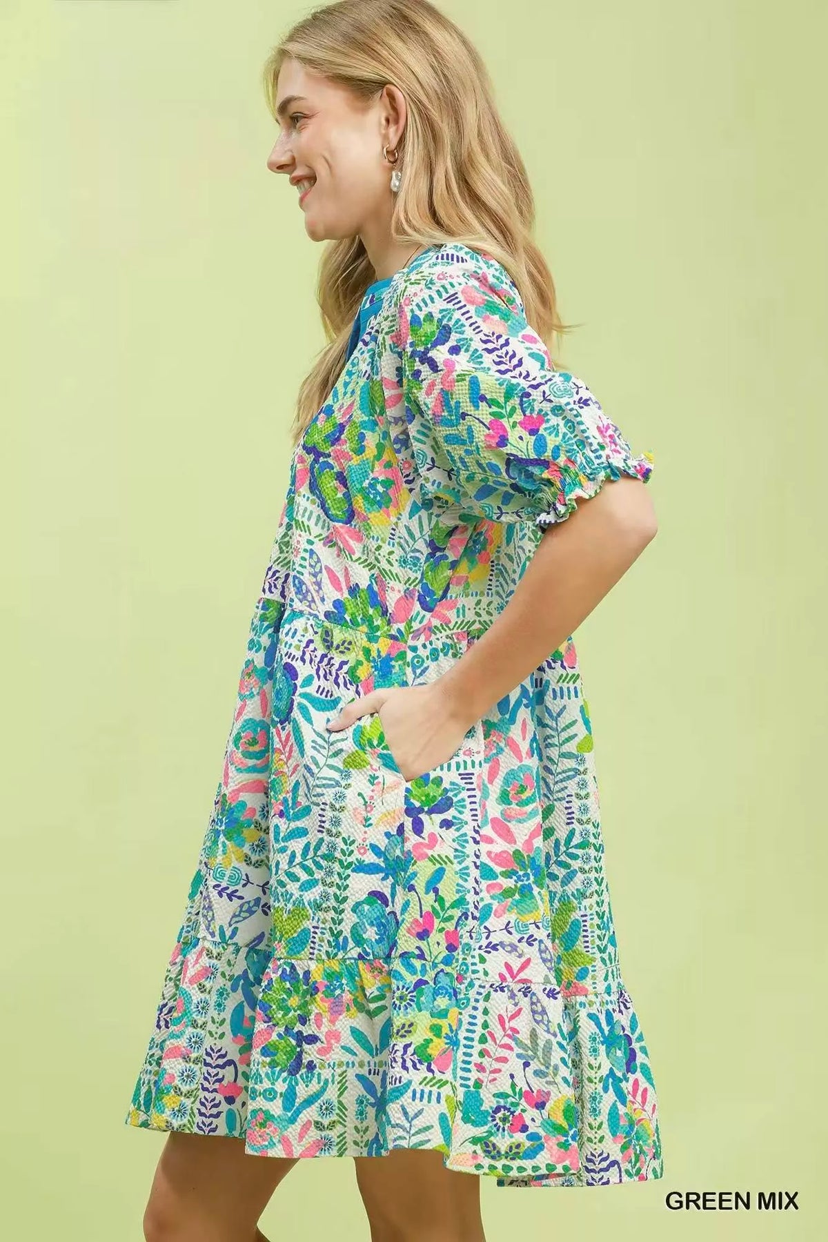 Green botanical print dress puff sleeve detail