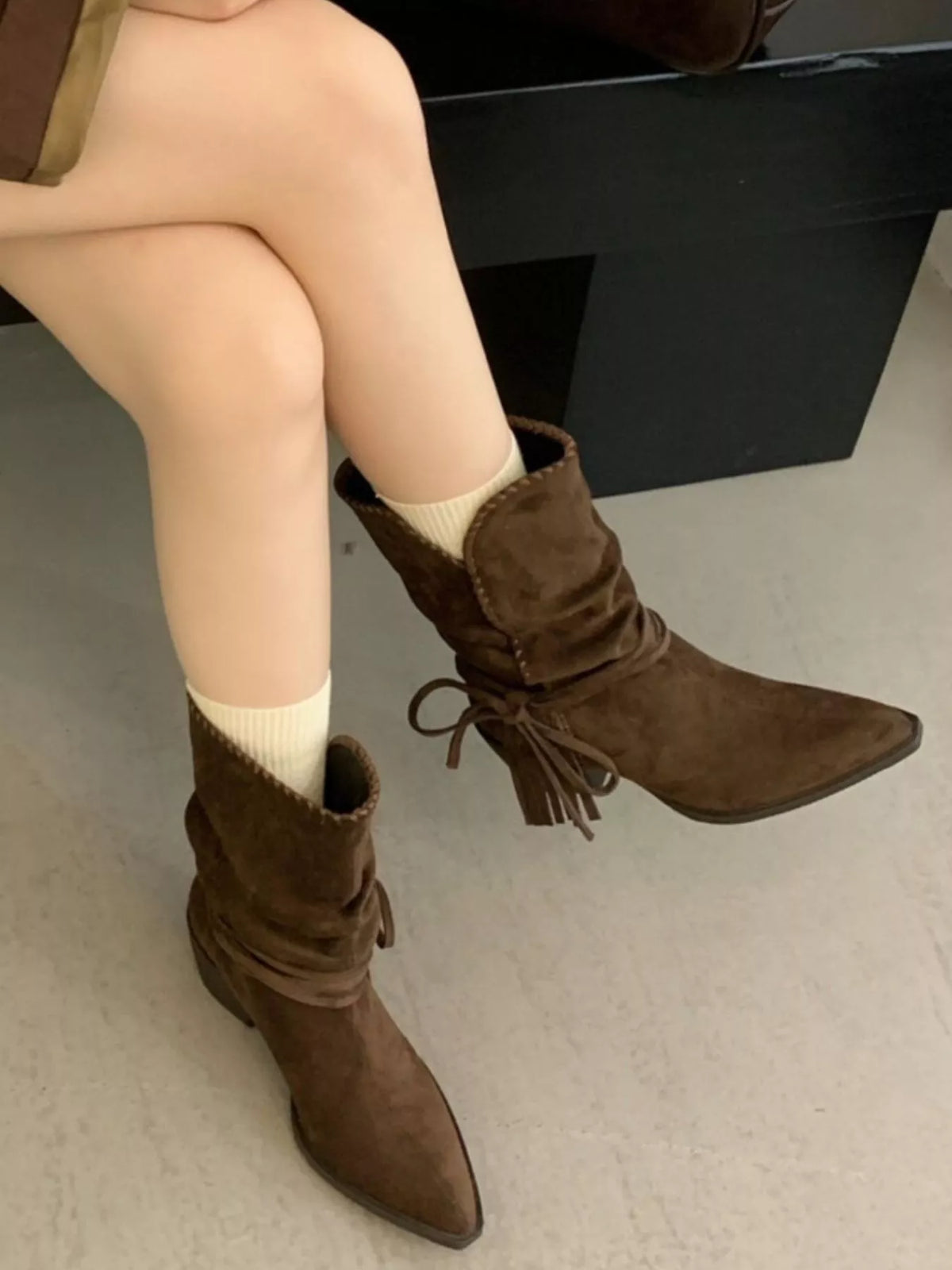 point toe block heel boots tan styled with denim