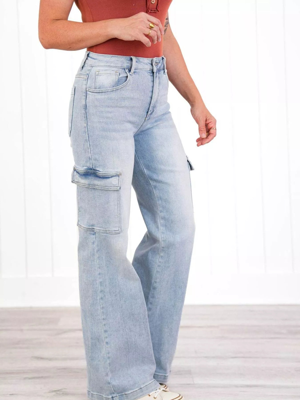Light blue wide leg cargo jeans side view