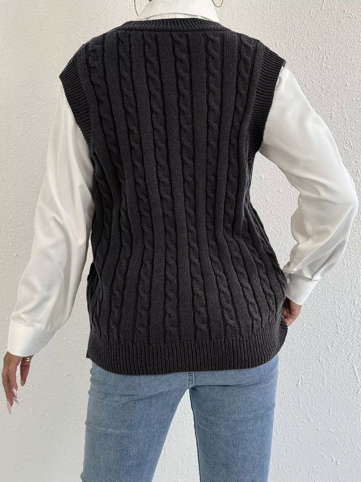 Cable knit button up sweater vest full length styled look