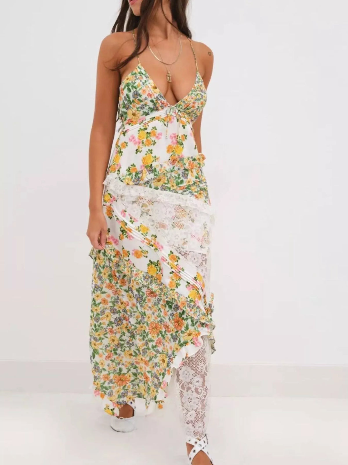 Full length lace maxi dress styled for an event