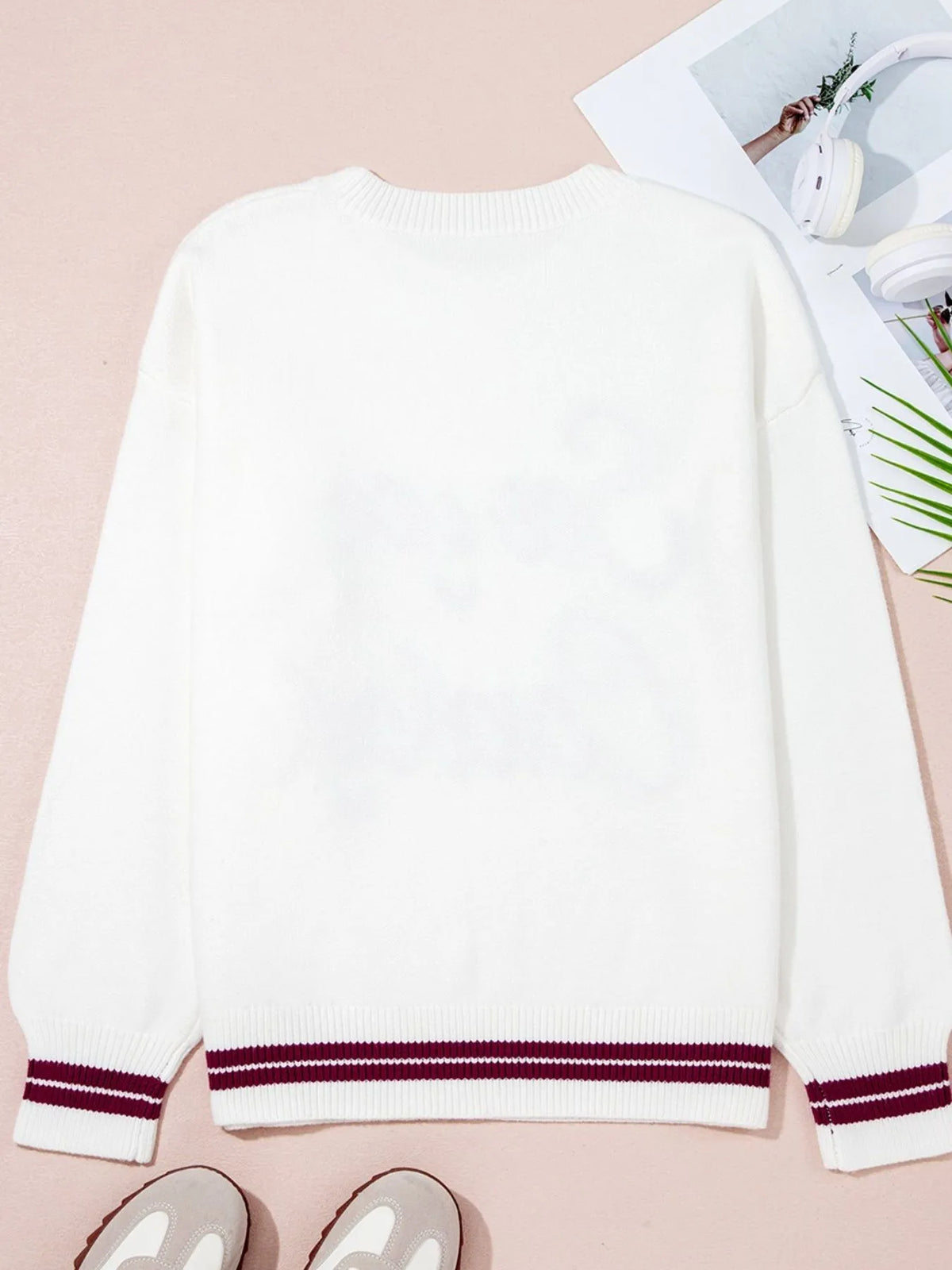 Letter hem round neck sweater styled outfit view