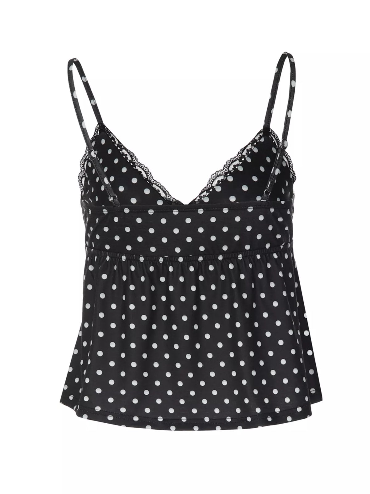 Cropped hem of the polka dot cami top