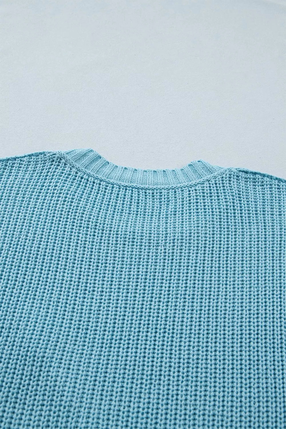 Relaxed fit pastel blue knit sweater full look