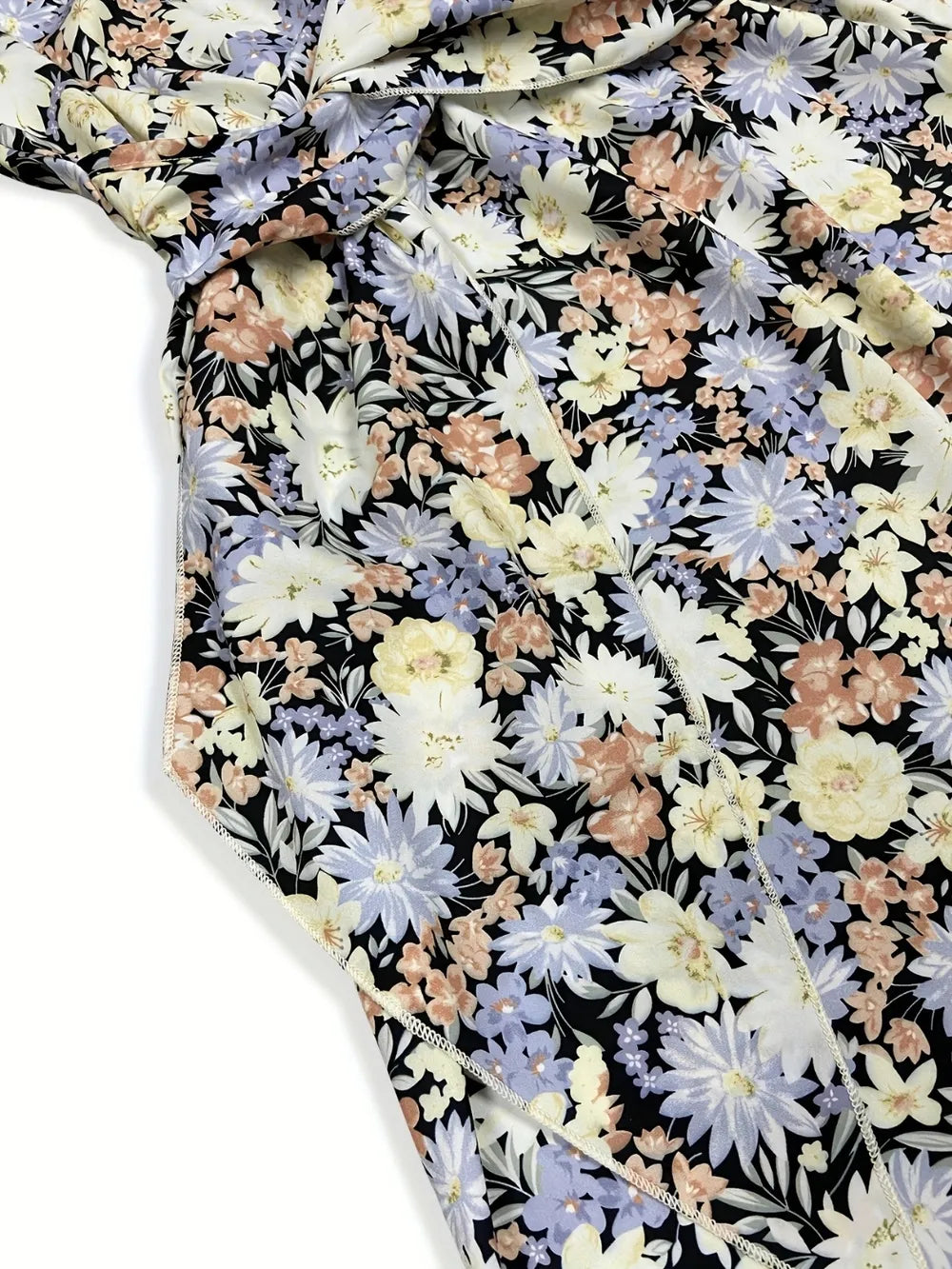 Floral sleeveless midi dress side view