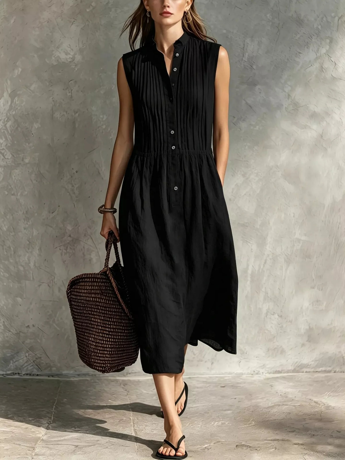 Sleeveless midi dress pleated skirt detail