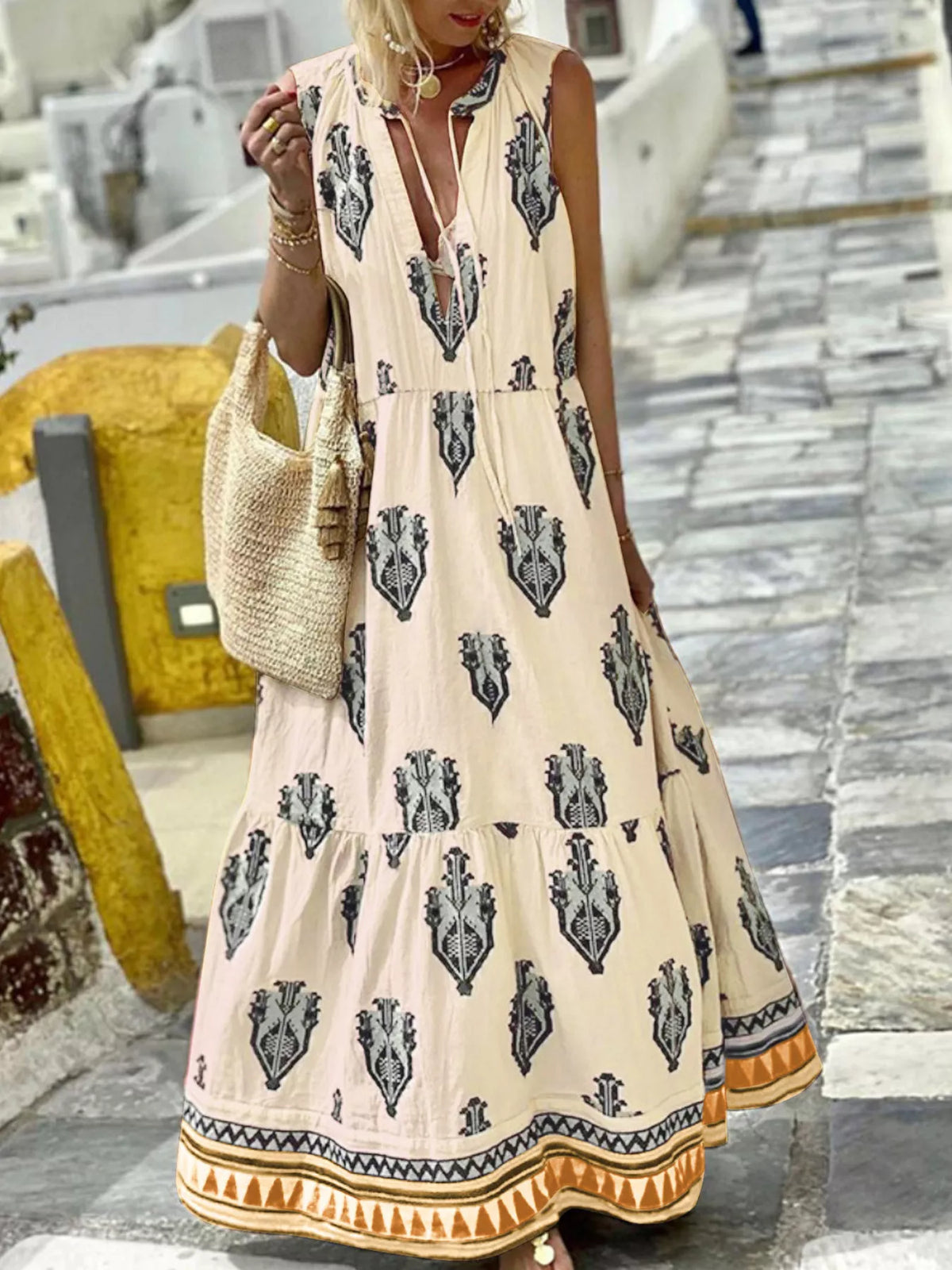 Printed sleeveless tiered maxi dress, side profile