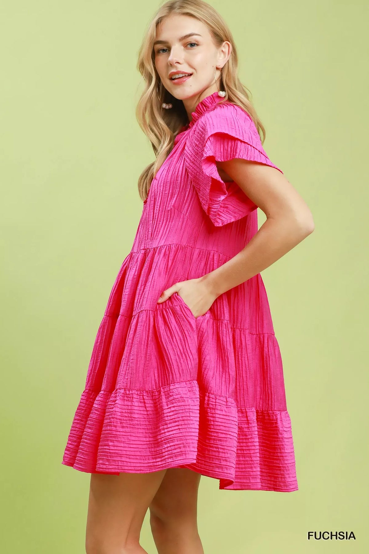 Fuchsia tiered ruffle sleeve textured mini dress back view