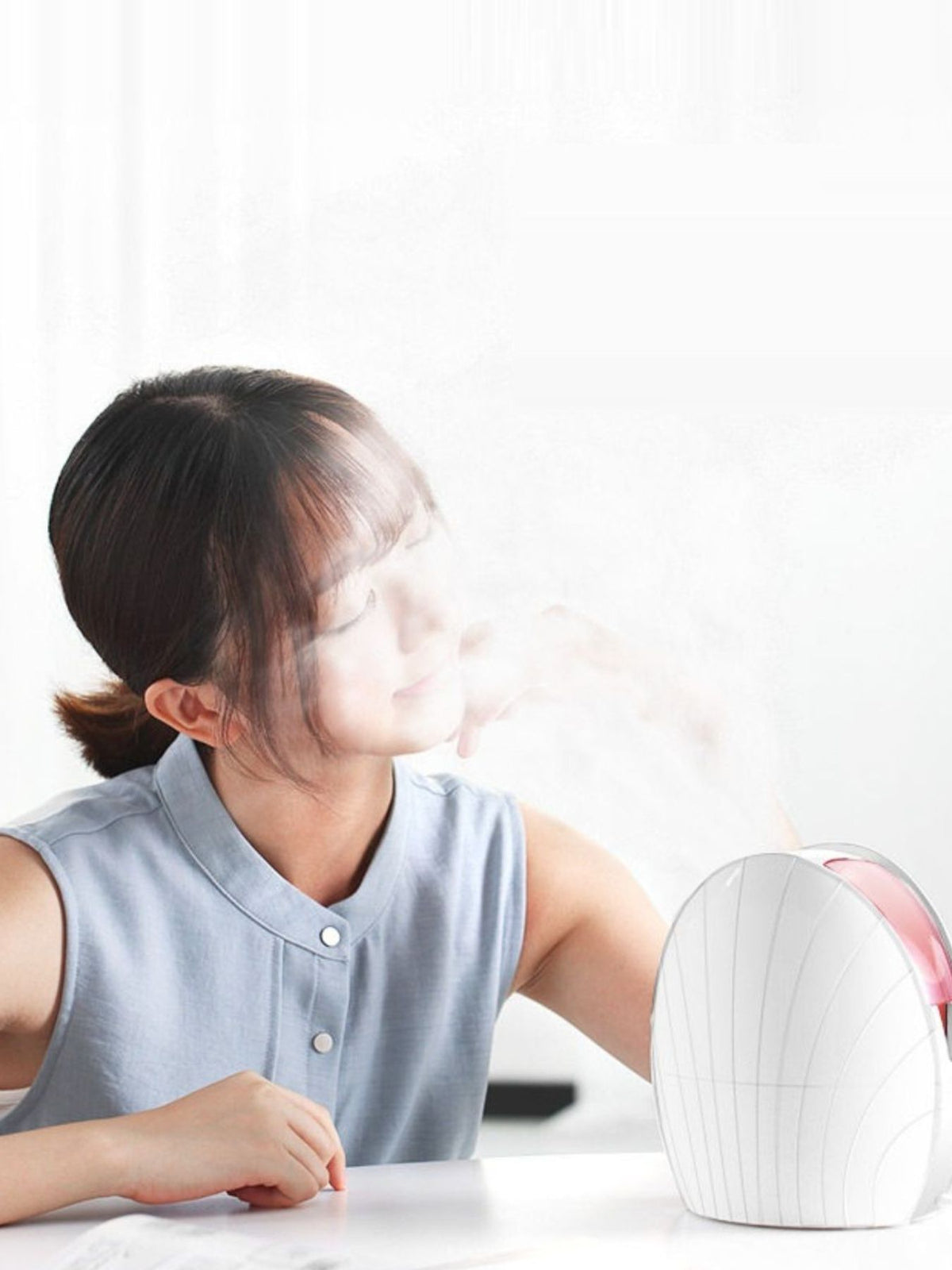 Facial steamer releasing warm steam