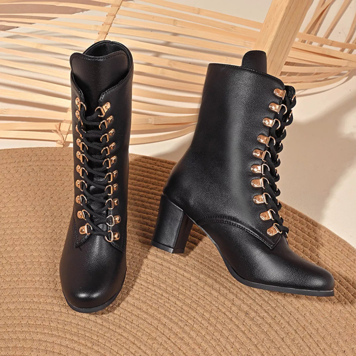 Lace up block heel boots styled on model