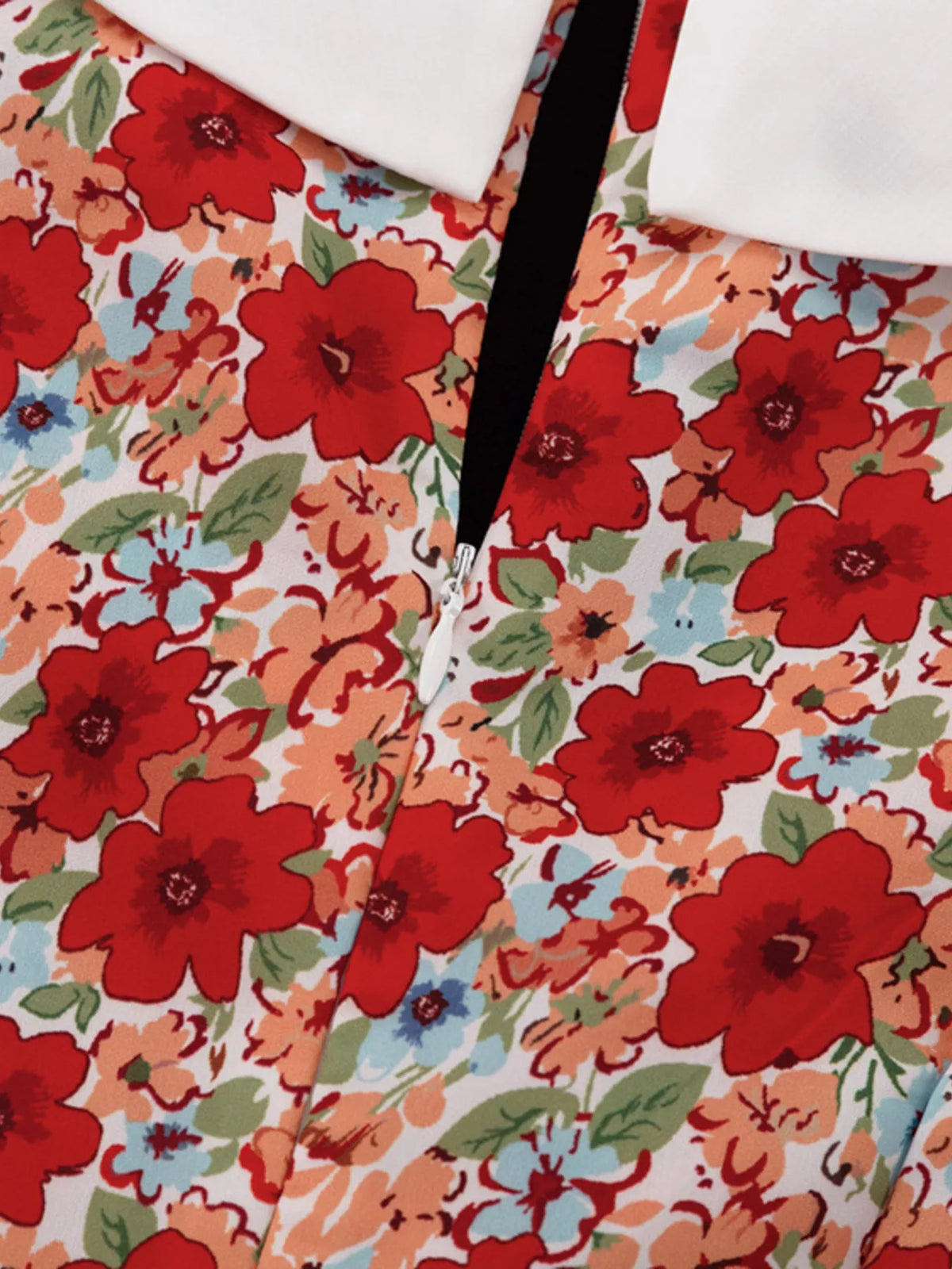 Womens floral mini dress seated styling view