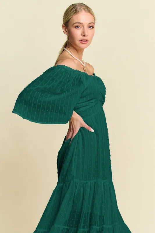 Swiss Dot Open Back Ruffle Midi Dress in Forest Green on model