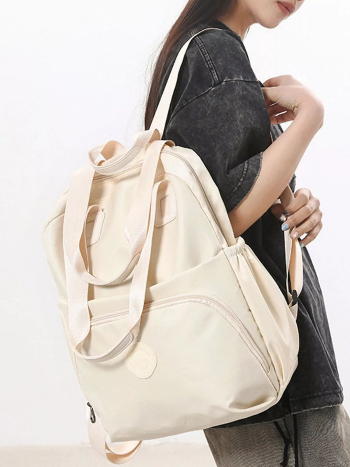 Solid color Oxford backpack shoulder strap detail