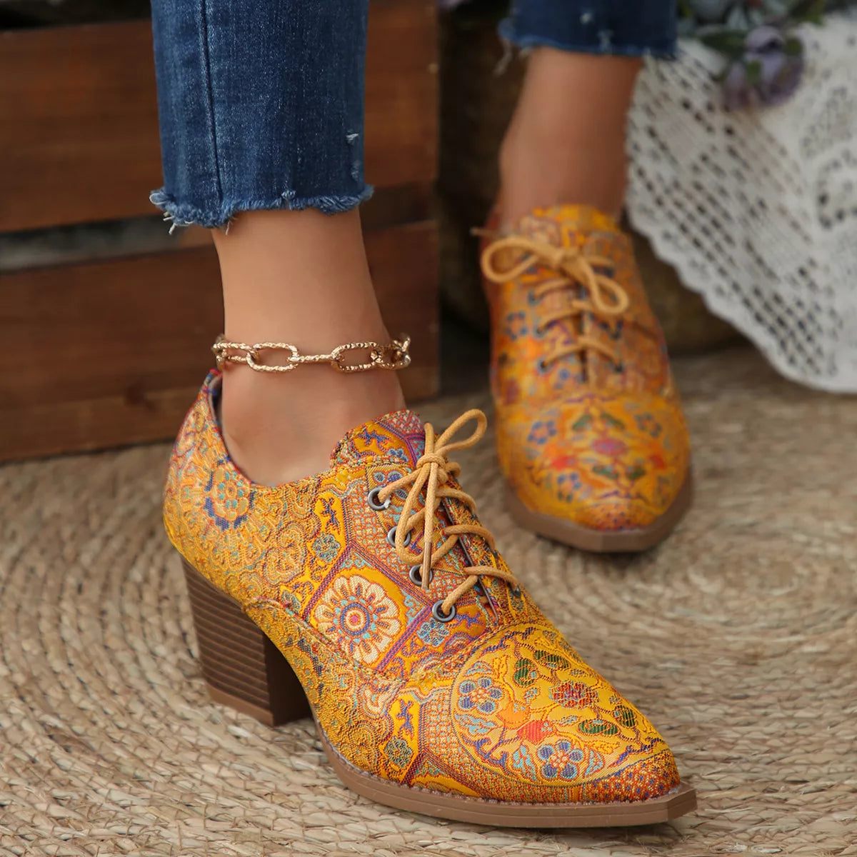 Point toe ankle boots full length view