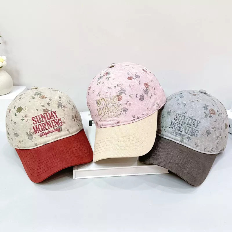 Embroidered floral print baseball cap front view