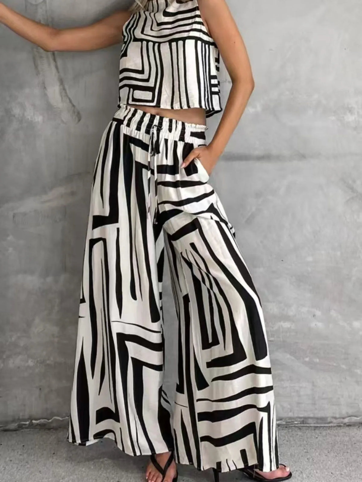Sleeveless geometric print top styling view