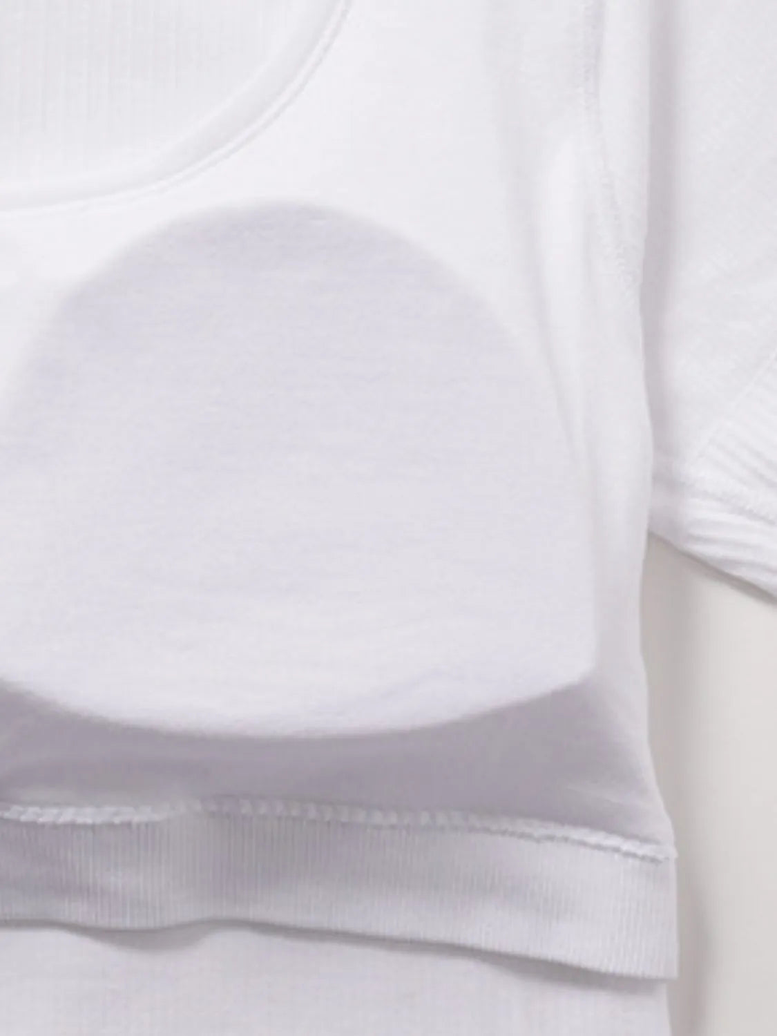 Square neck padded active t-shirt close up detail