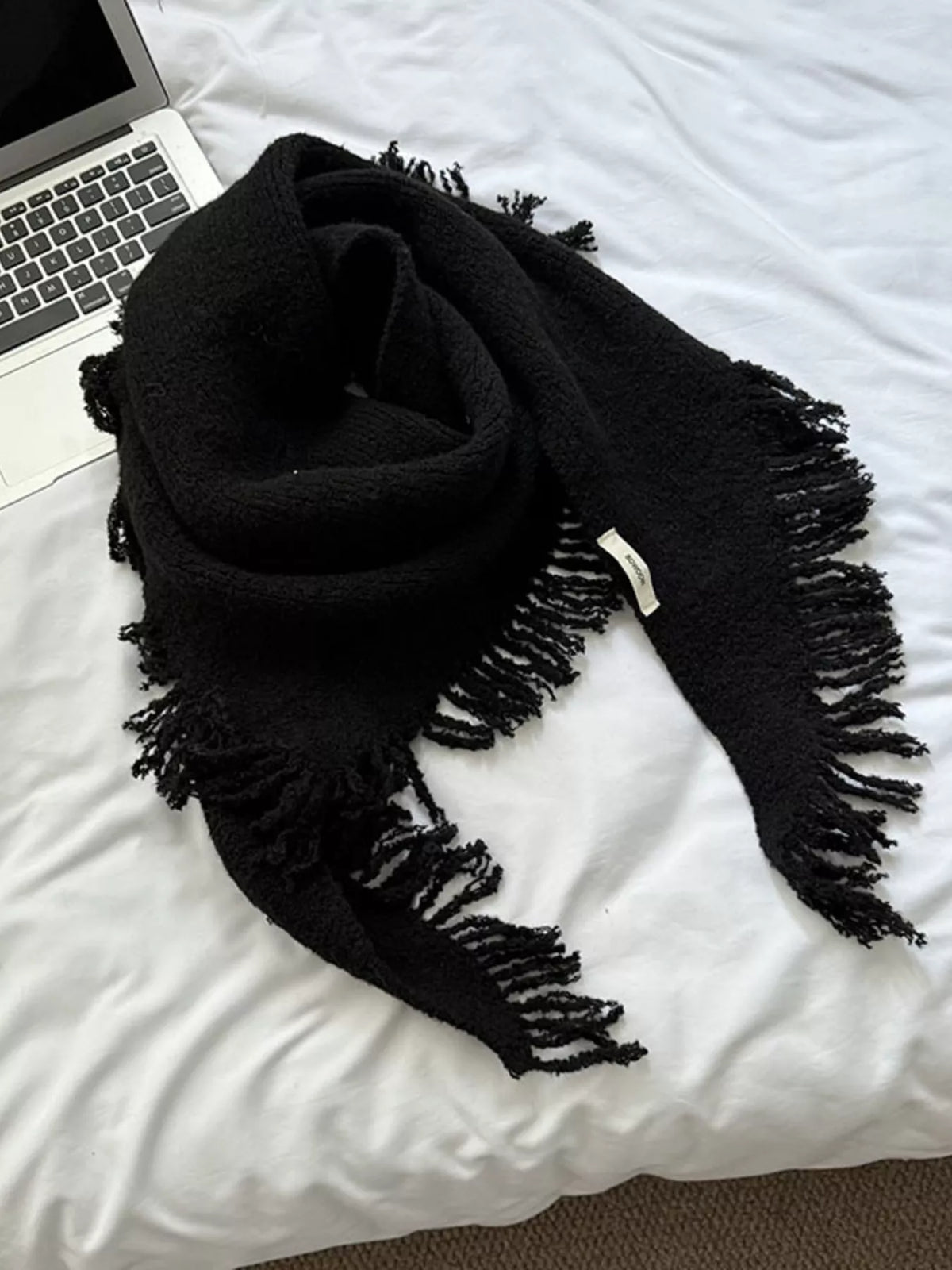 Off white fringe knit scarf draped