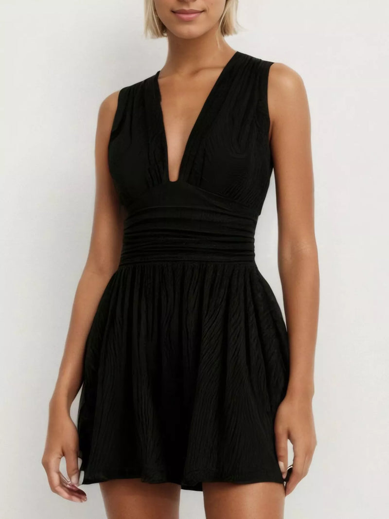 Deep V neck ruched sleeveless romper front view in black
