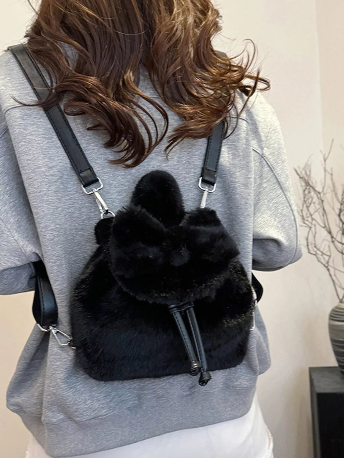 Drawstring plush backpack top closure