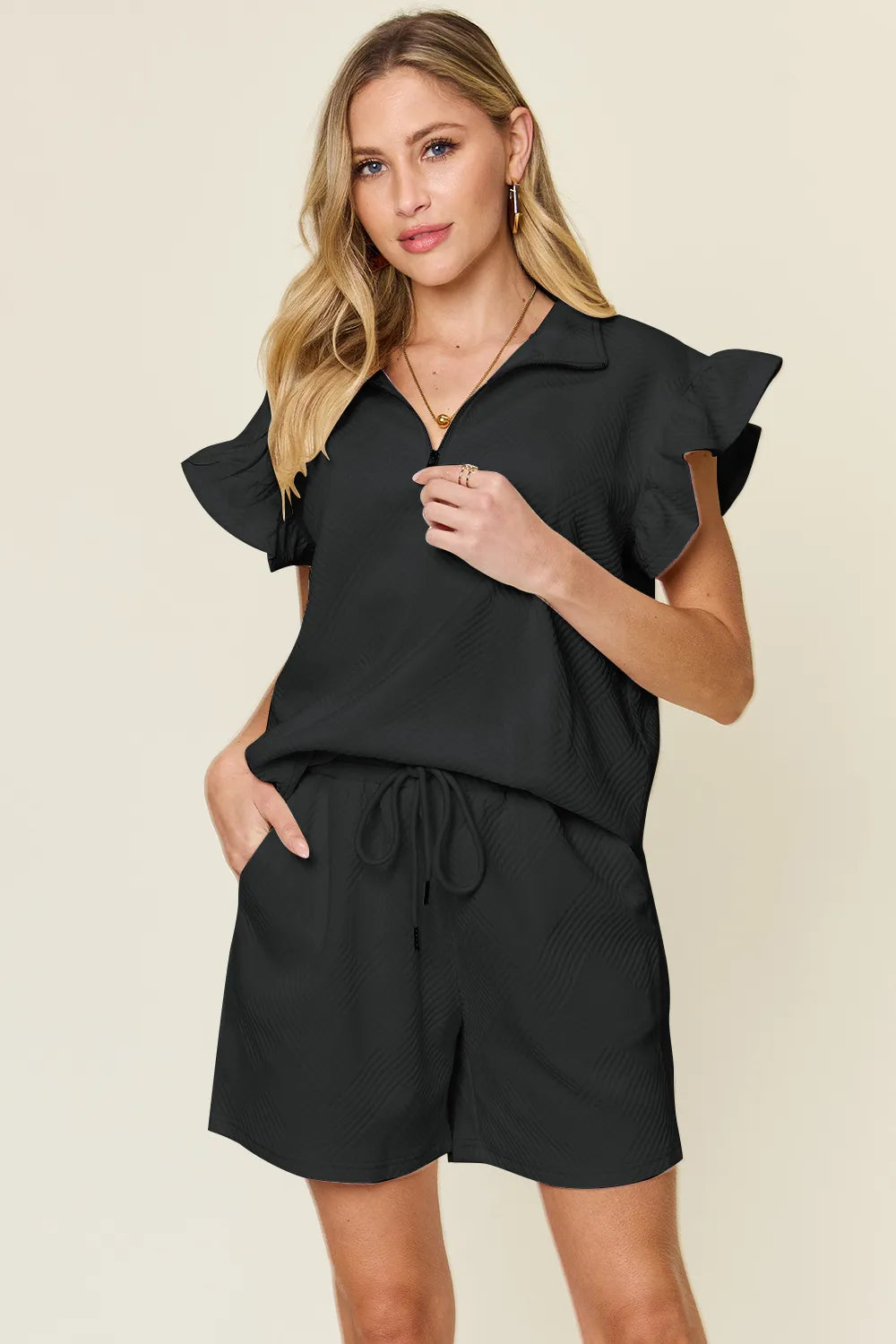 Drawstring shorts detail from matching two piece set