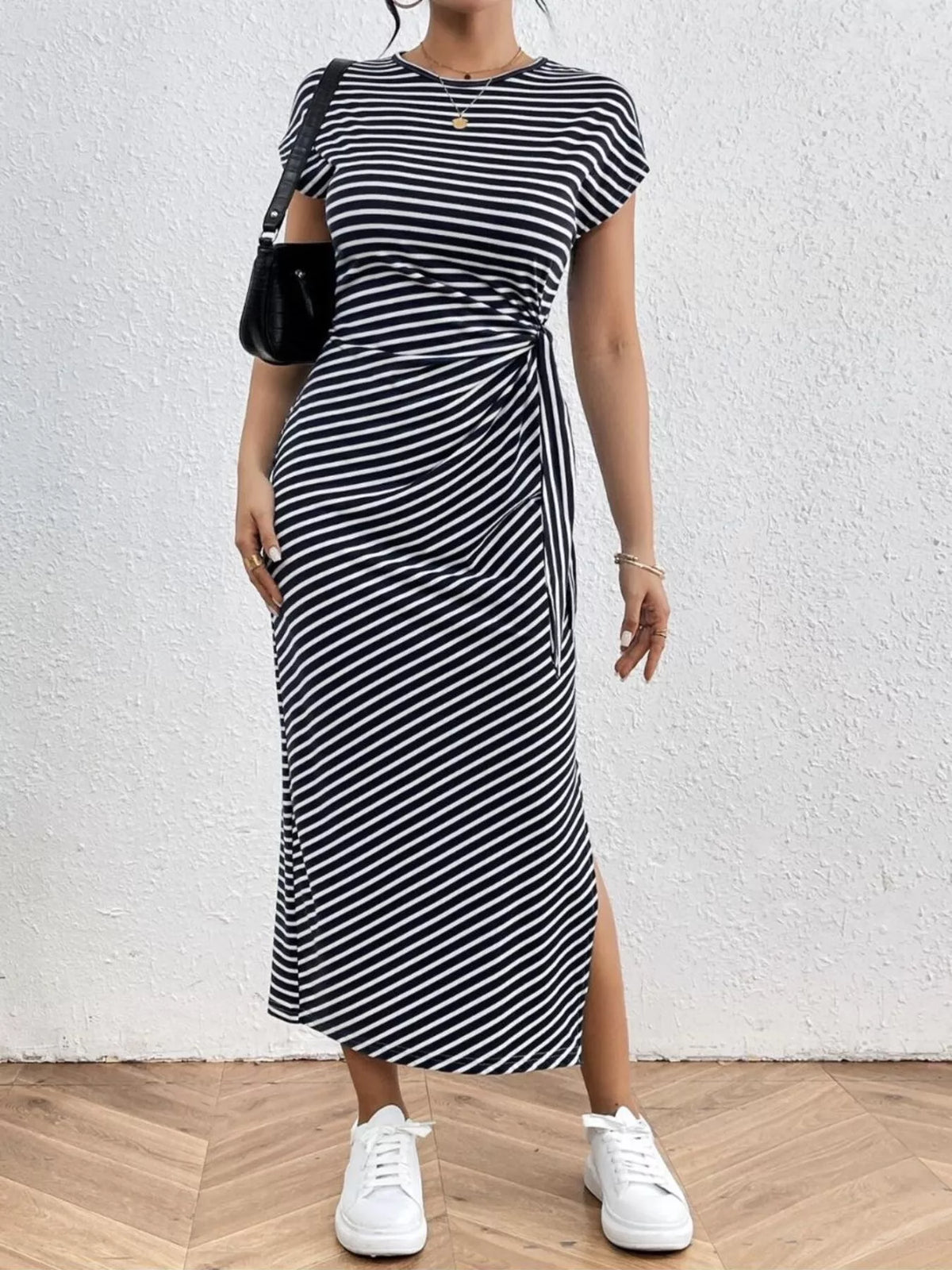 Striped tie waist dress laid flat, full garment view