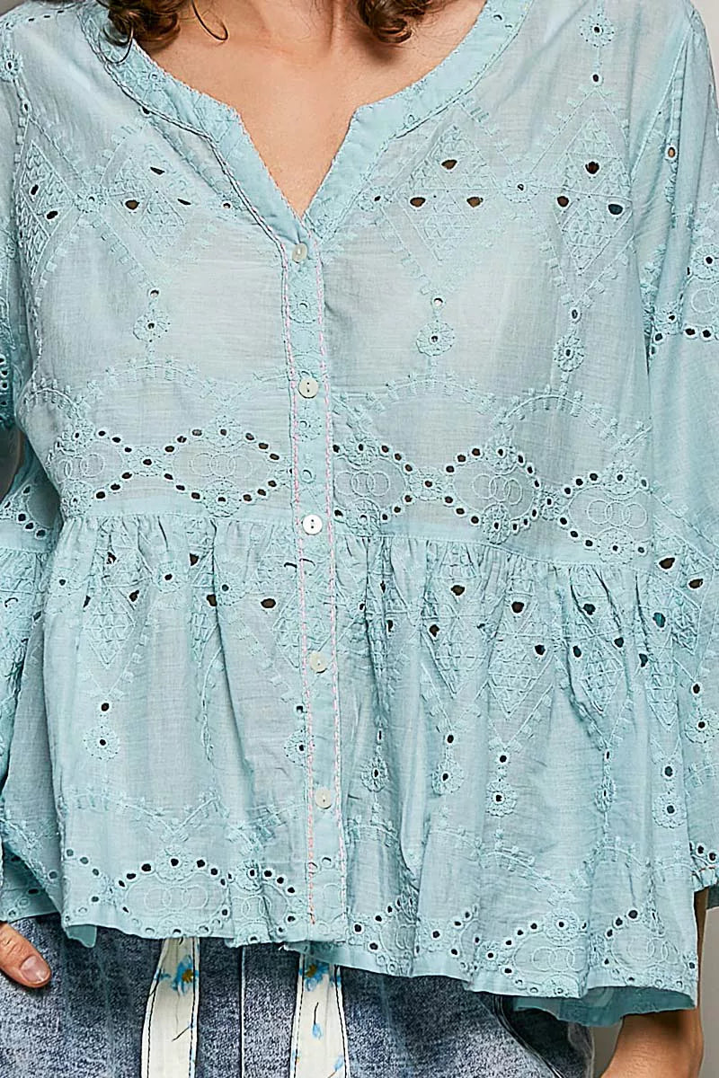 Aqua eyelet peplum shirt styled with high waisted jeans