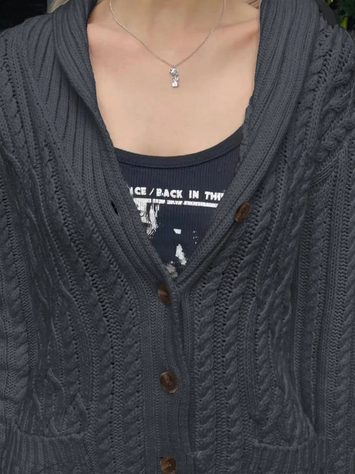 cable knit button up cardigan fabric detail close up