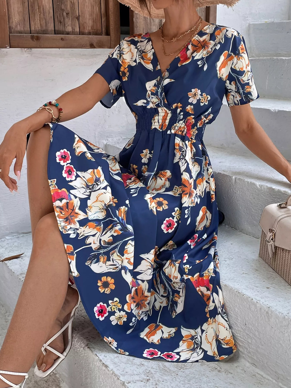Printed short sleeve smocked midi dress close up view