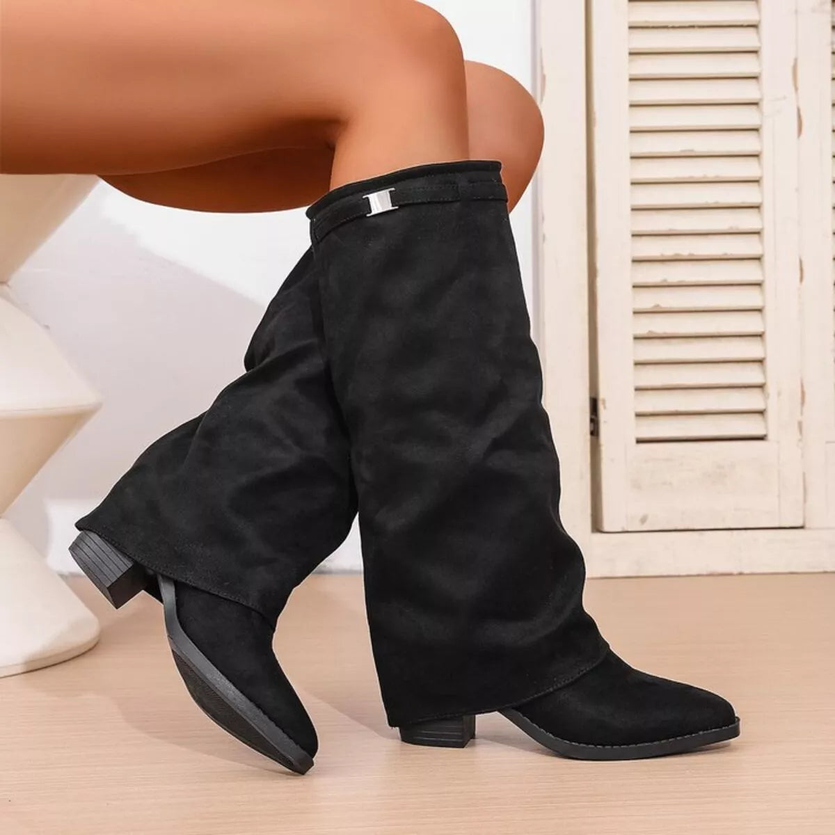 Point toe block heel boots heel detail