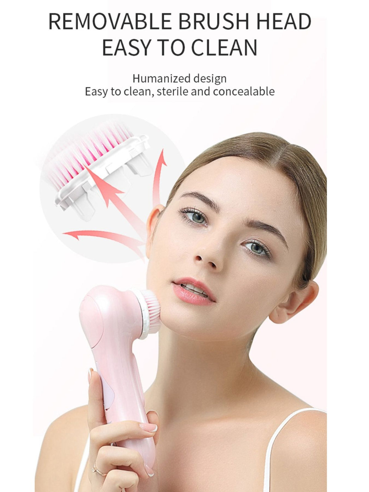 Facial cleansing brush held in hand