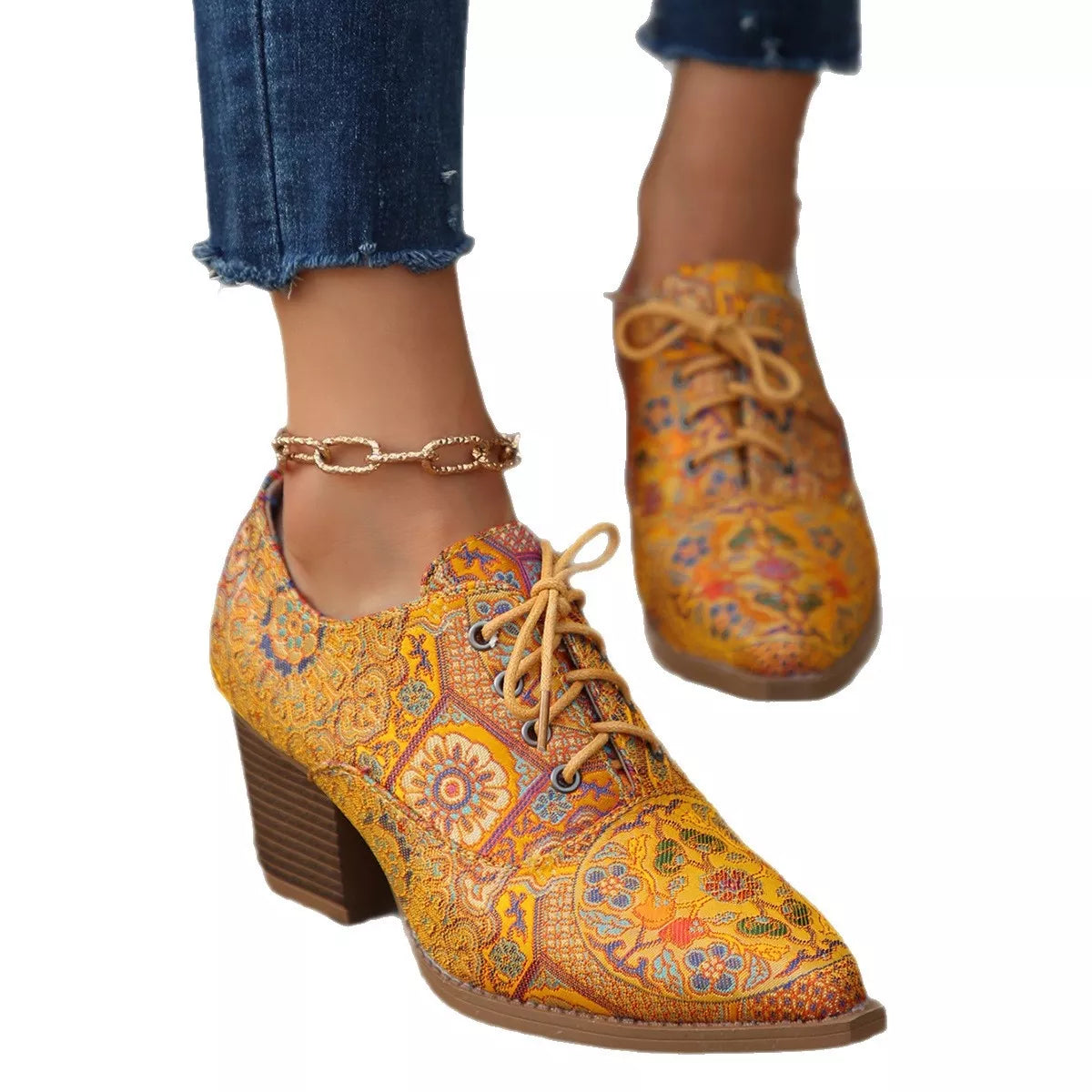 Point toe ankle boots three quarter view