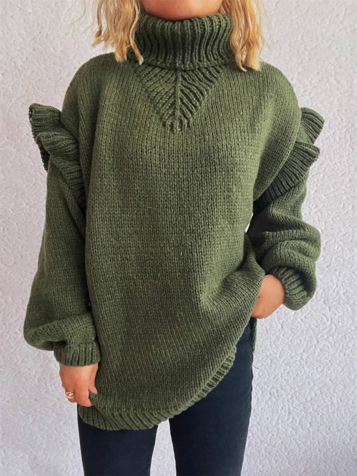 Ruffled turtleneck long sleeve sweater close up detail