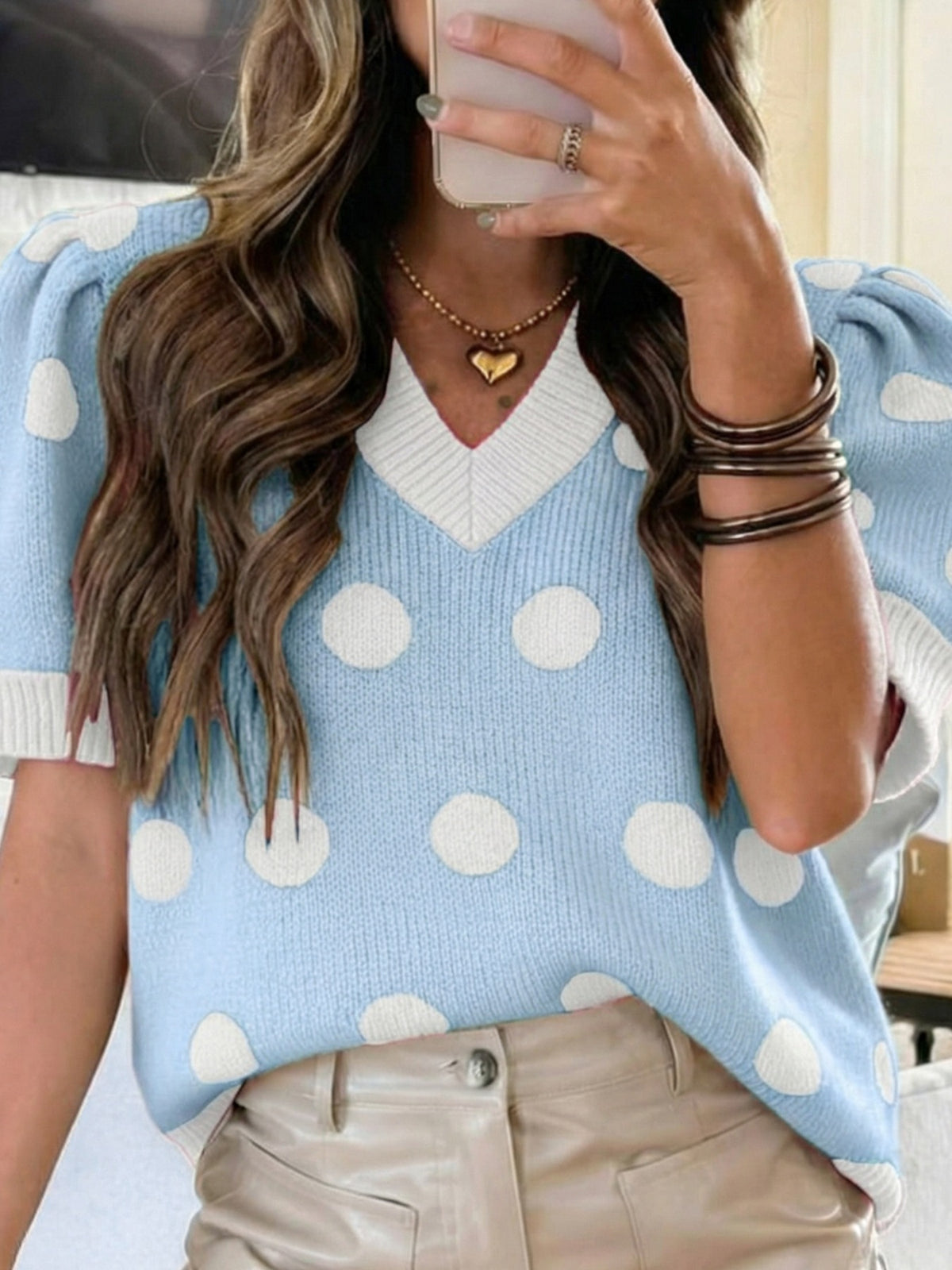 Puff sleeve polka dot sweater fabric detail