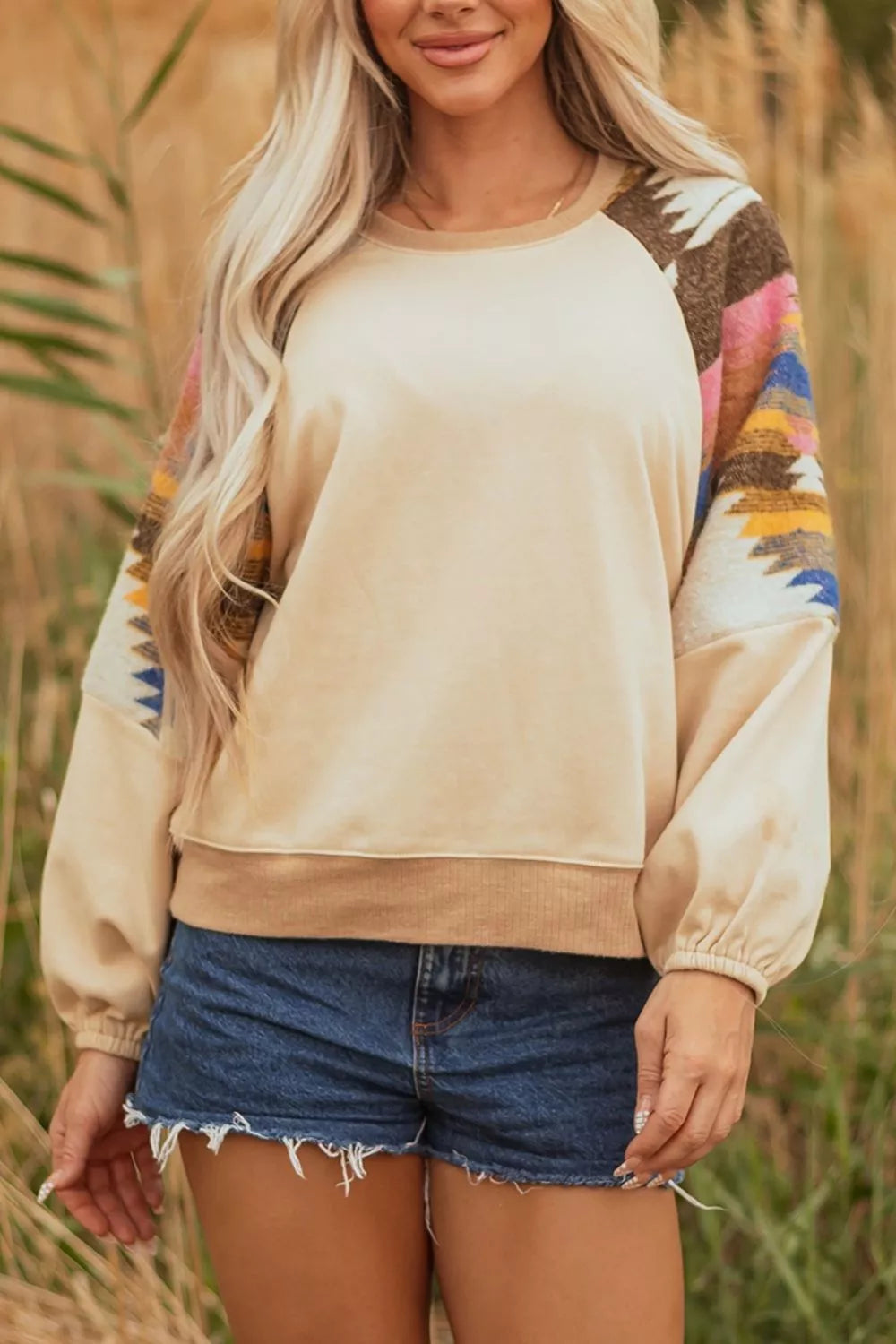 Sequined rodeo graphic western sweatshirt in tan shown on a model