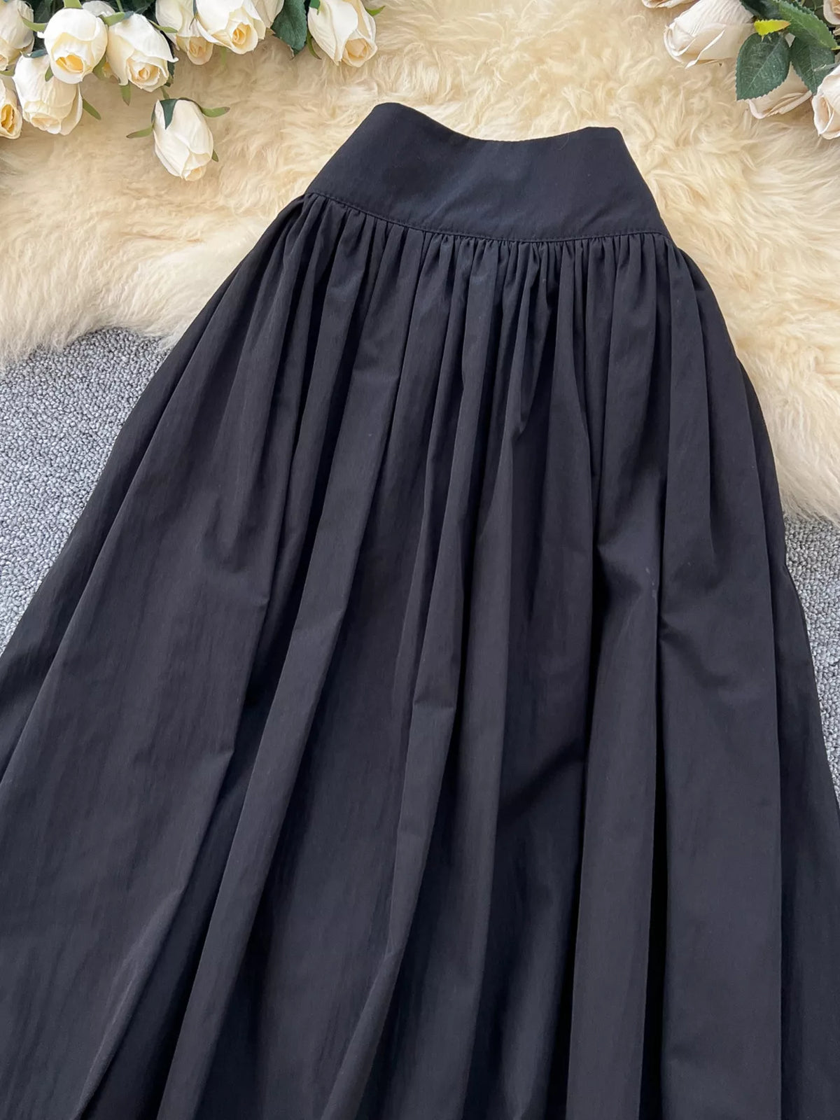 Pocket detail on the high waisted long skirt