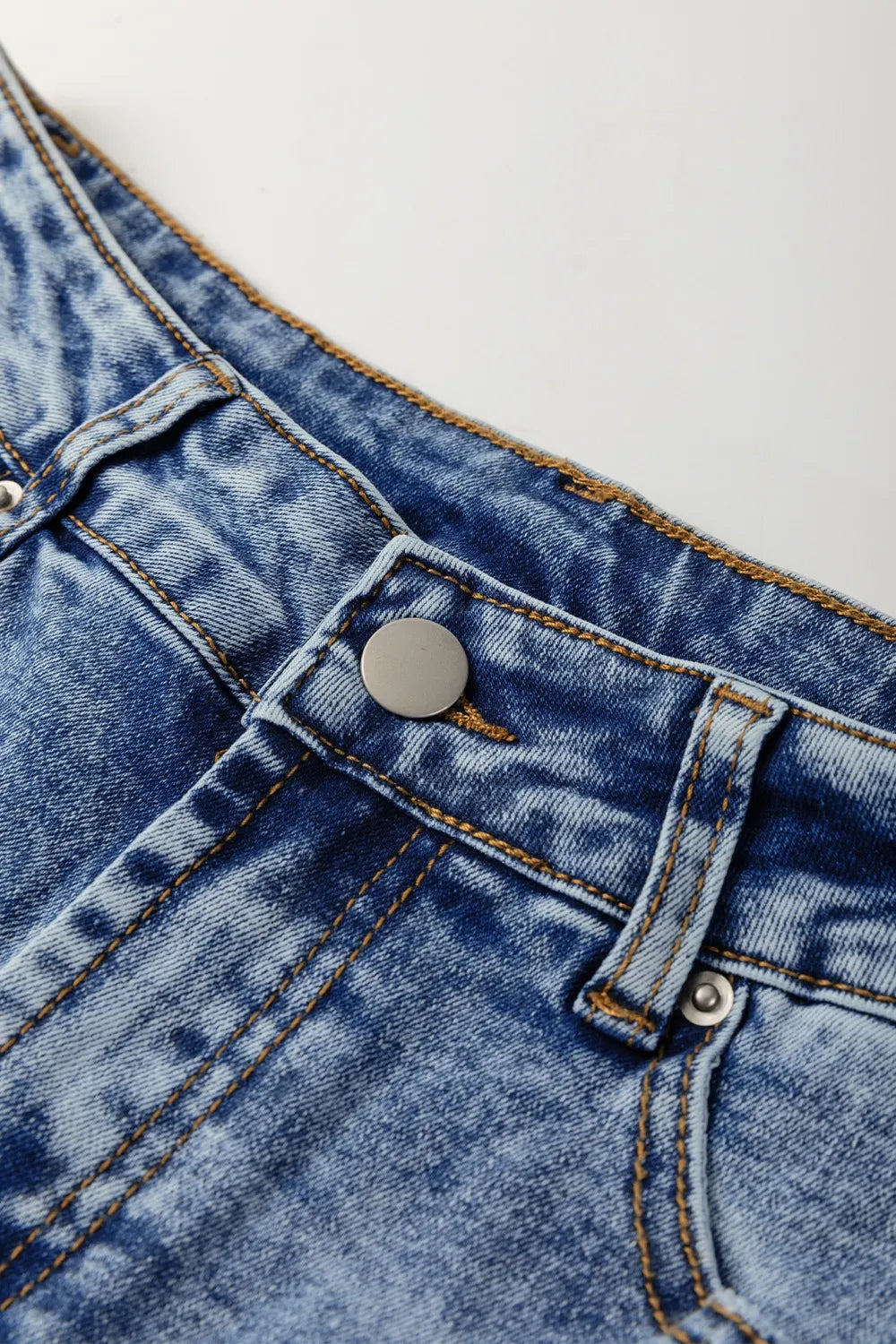 Pocket detail on wide leg cuffed jeans