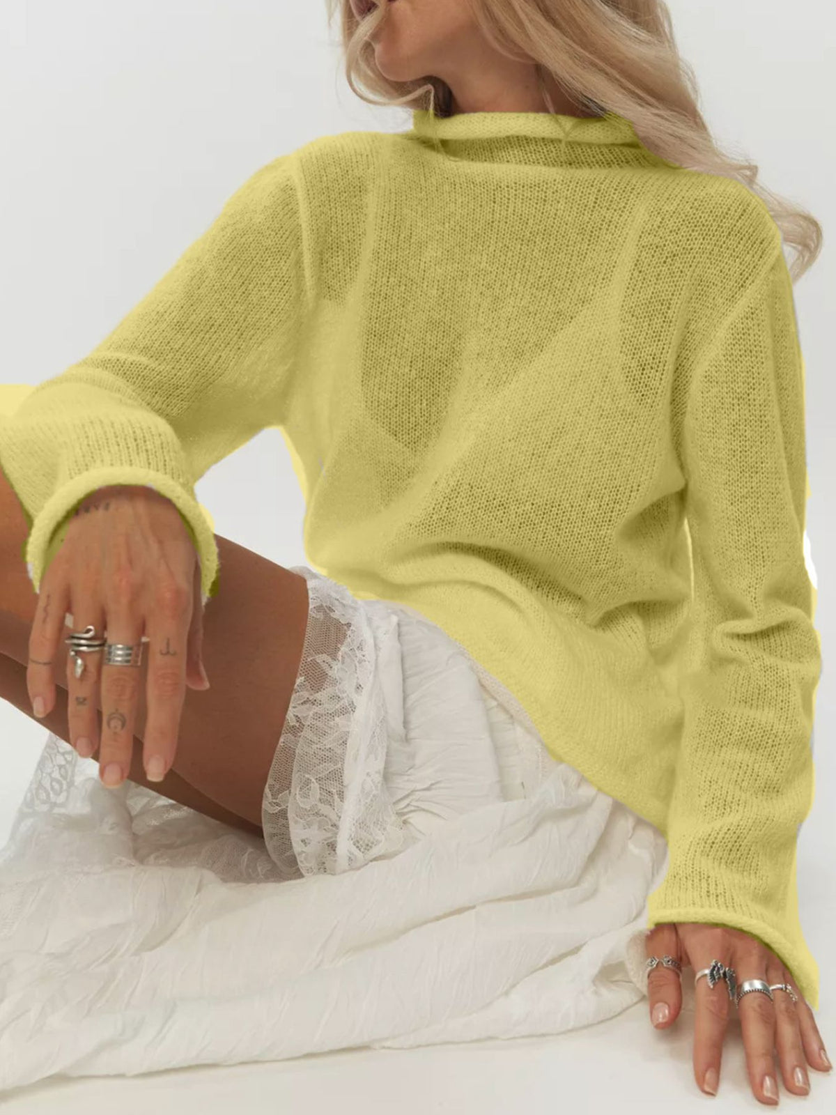 Mock neck sweater styling detail